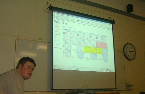 Our volunteer, Kit, presenting an early version of Three Rings in 2002
